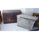 An early 20thC beech and canvas covered trunk with straight sides and a domed, hinged lid  21"h