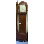 An early 19thC oak longcase clock with a round arch hood and flank pillars, over a straight trunk