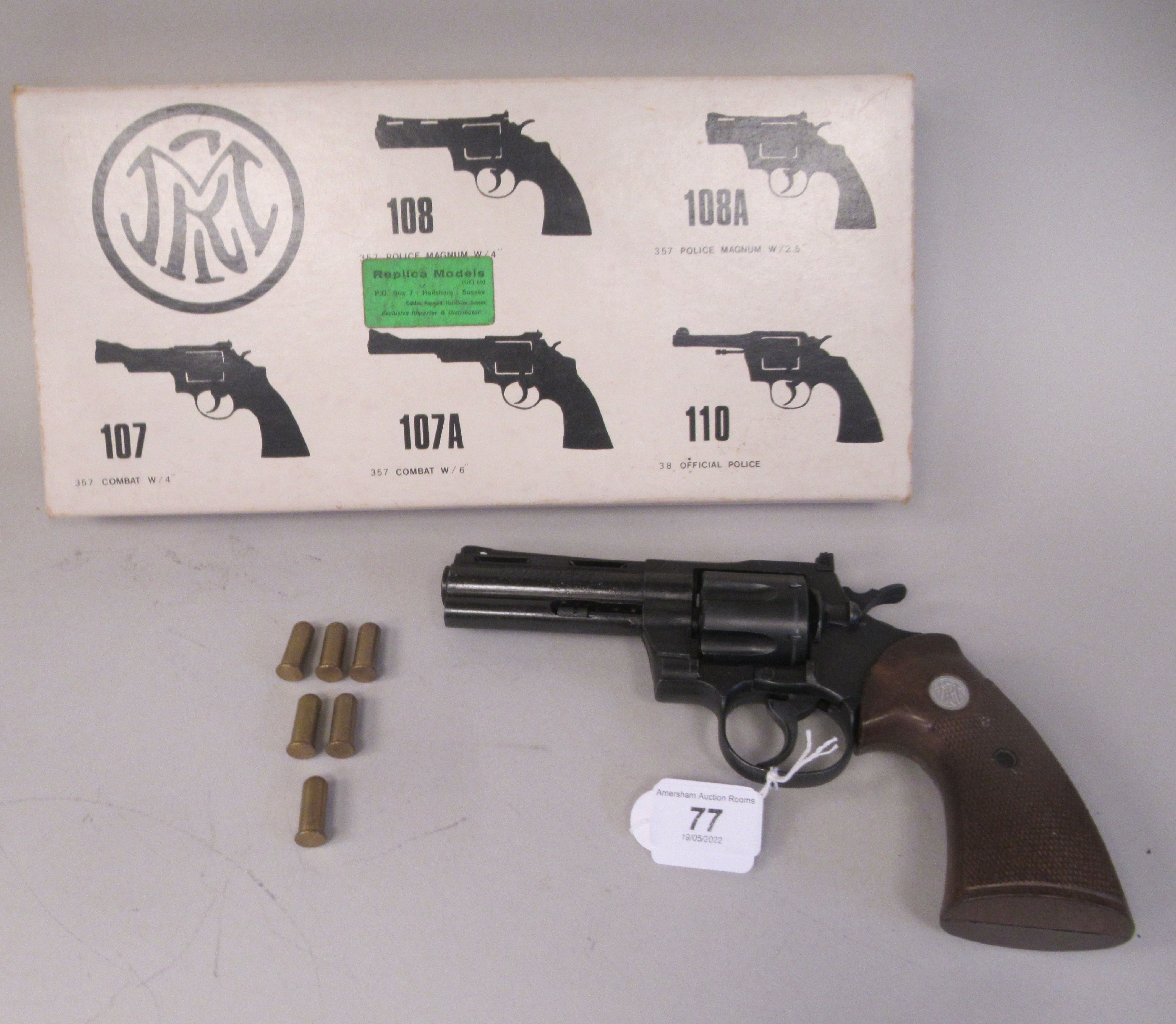 A replica MGC 1970s Colt Python revolver with six dummy rounds  boxed