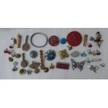 Items of personal ornament: to include brooches and an enamel hinged bracelet
