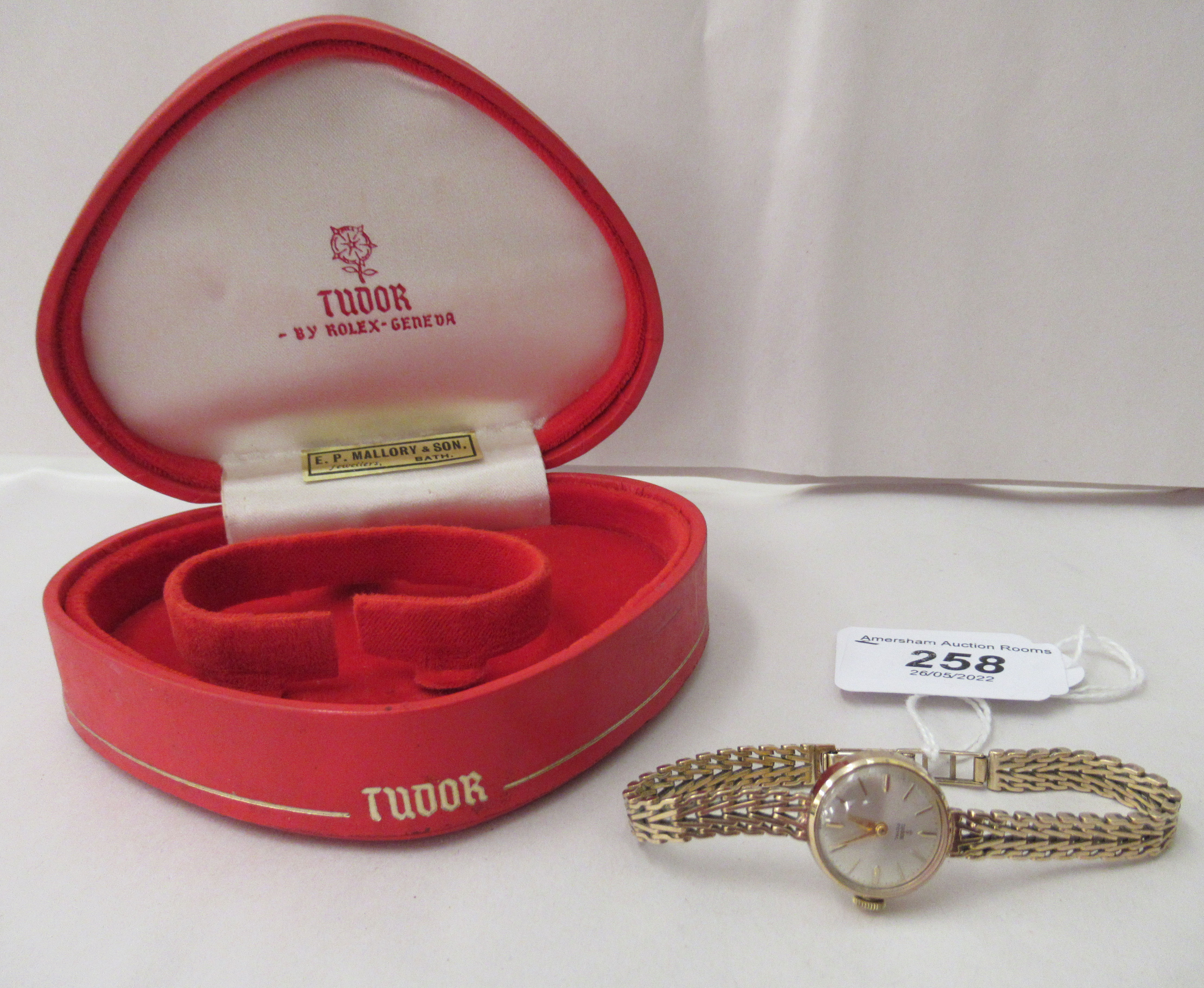 A ladies Tudor 9ct gold bracelet wristwatch, faced by a baton dial  cased