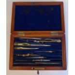 Early 20thC engineers' drawing instruments in an associated mahogany case