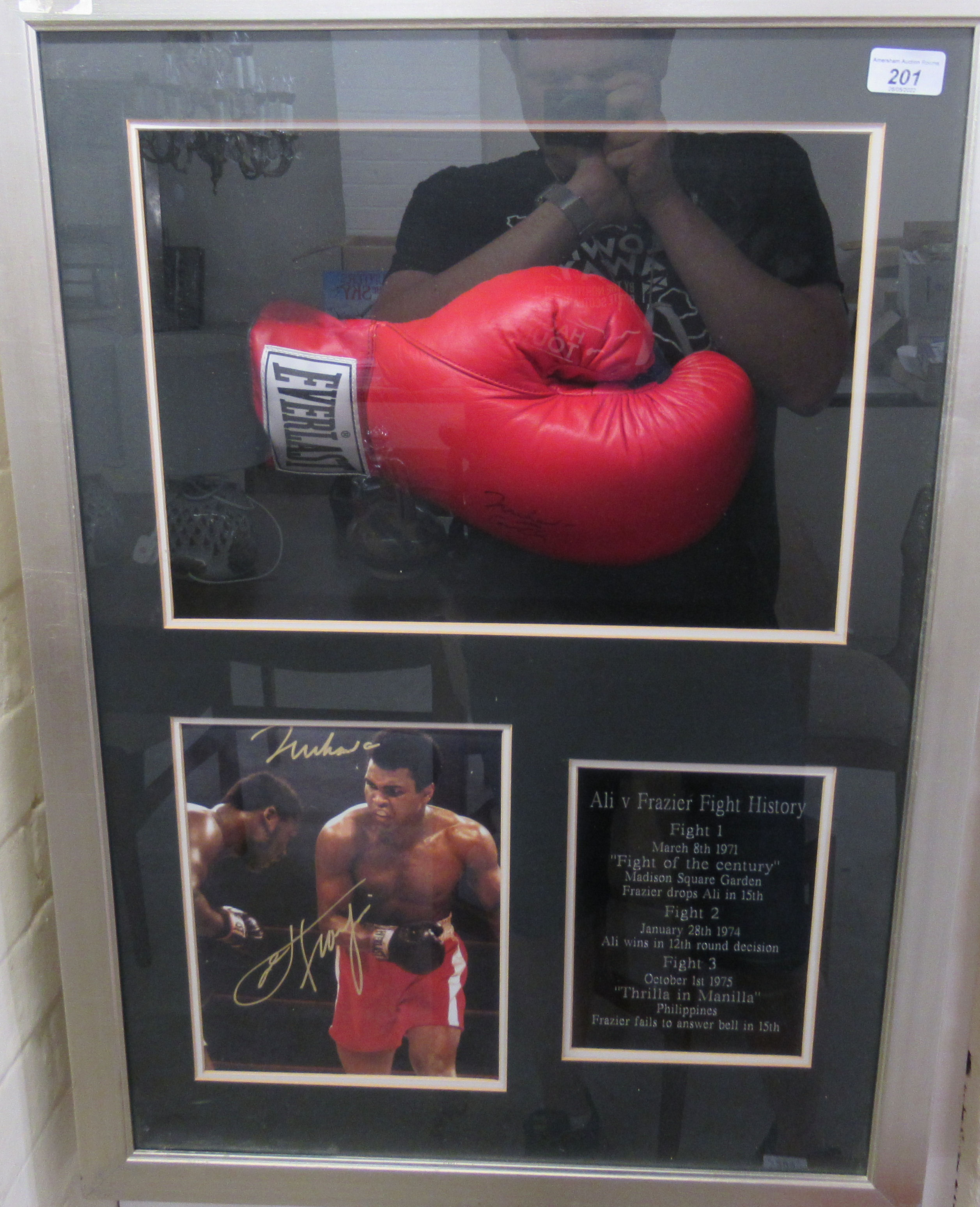 Ali V Frazer - a boxing glove and a picture, bearing signatures, in a box frame  27" x 20"