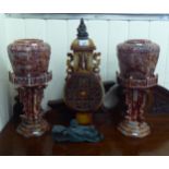 Oriental carved hardstone ornaments: to include a moonflask design vase and cover, decorated with