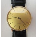 A Mappin & Webb 9ct gold cased wristwatch, the quartz movement faced by a baton dial, on a black