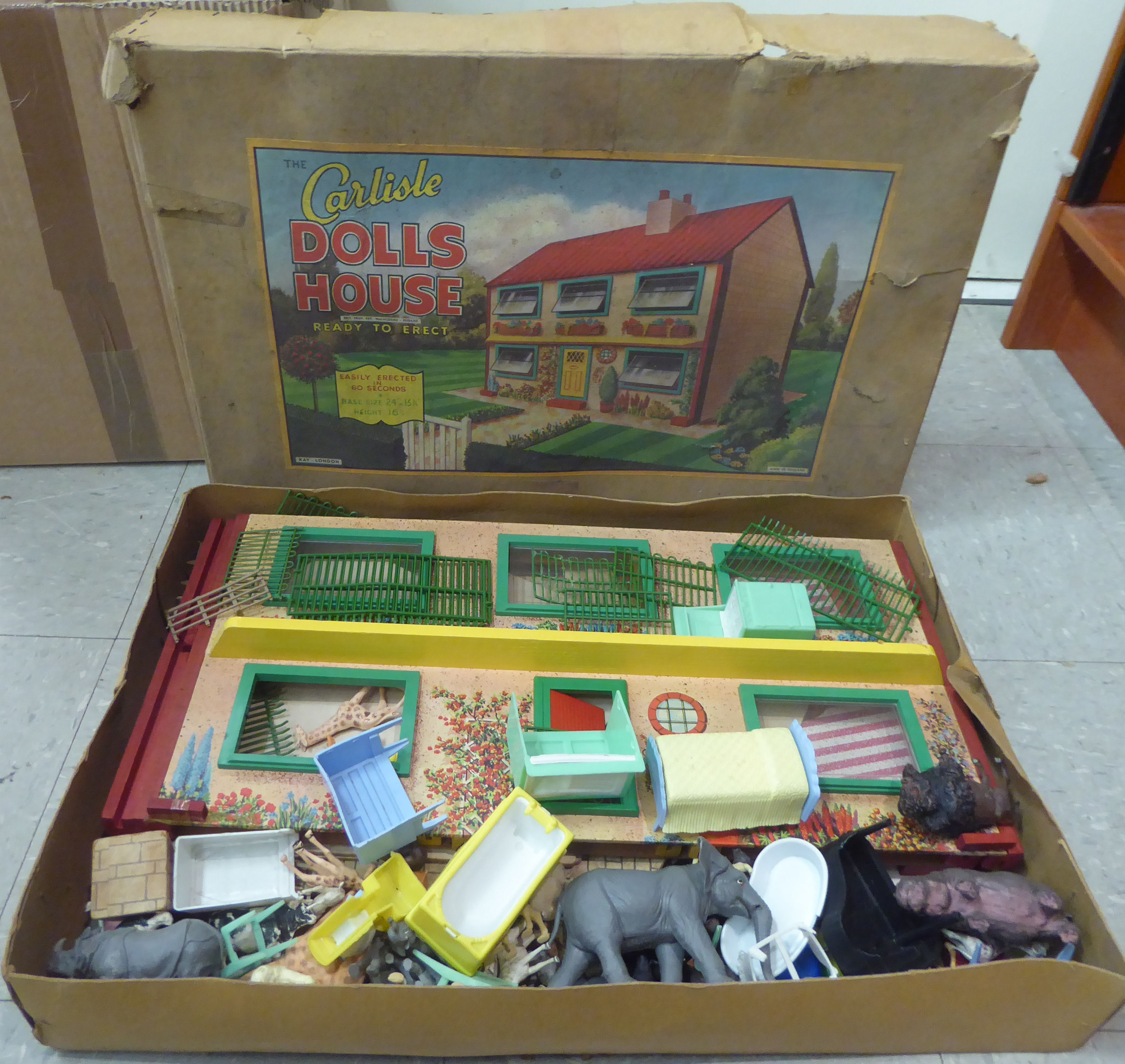 A Kay - London 'The Carlise Dollshouse'  boxed; with associated furniture and miscellaneous animals