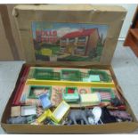 A Kay - London 'The Carlise Dollshouse'  boxed; with associated furniture and miscellaneous animals