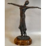 A modern Art Deco style patinated bronzed metal figure, a female dancer, on a marble plinth  15"h