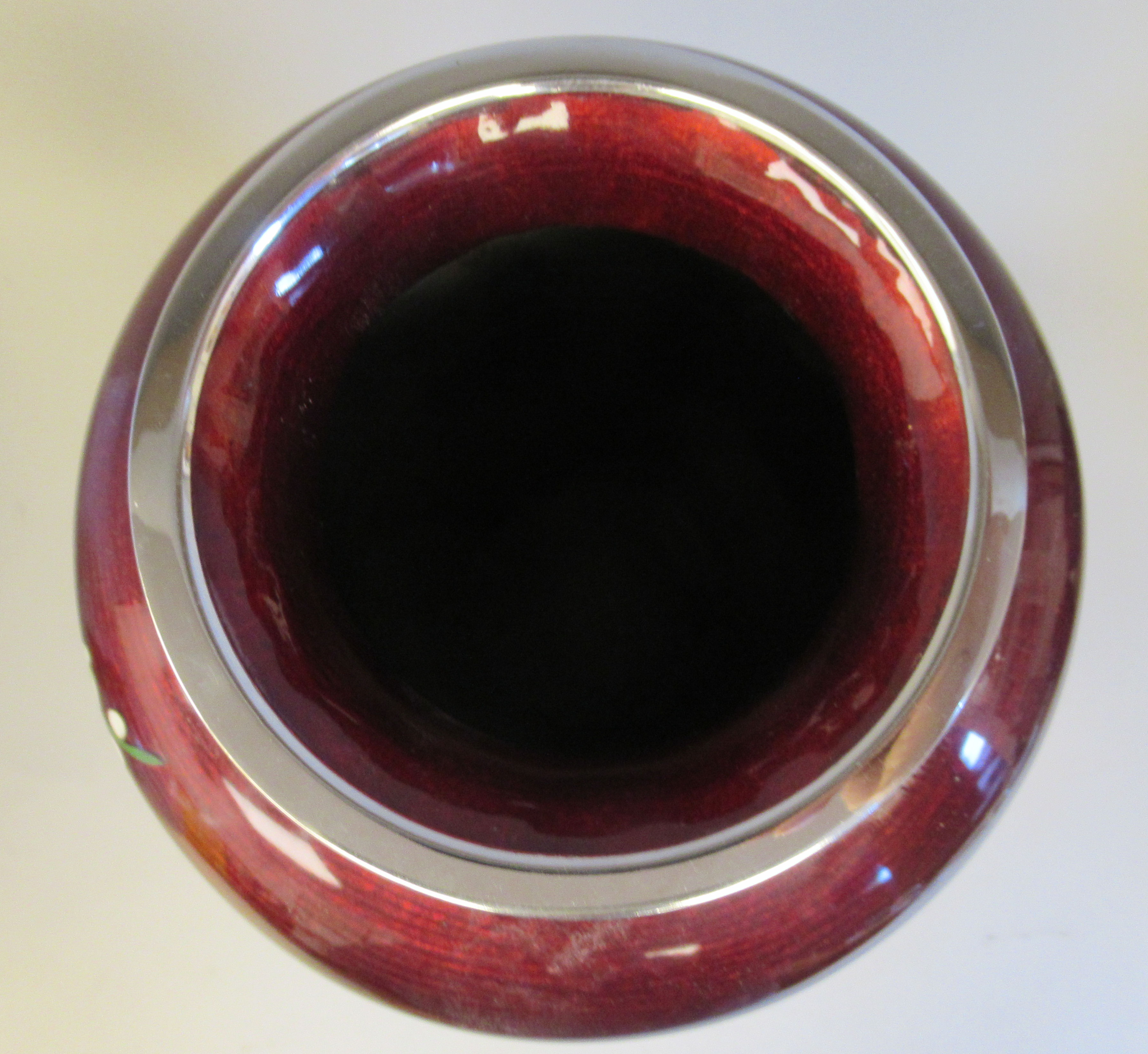 A 20thC oxblood coloured enamel vase of shouldered baluster form, decorated in colours with - Image 5 of 5