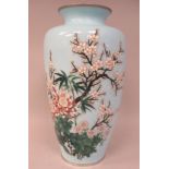 A 20thC pale blue enamel vase of shouldered baluster form, decorated in colours with