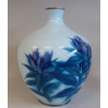 A 20thC enamelled pale blue vase of squat, bulbous form, having a short, narrow neck, decorated in