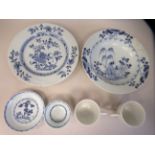 Chinese 'Nanking Cargo' porcelain, viz. a tea bowl and saucer; a pair of footed cups; a broad rimmed