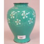 A 20thC green enamel vase of waisted baluster form, decorated with repeating trailing designs  8"h