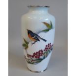 A 20thC white enamel baluster shaped vase, decorated with a robin and red winter berries  9"h