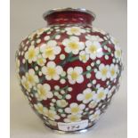 A 20thC ruby coloured enamel bulbous vase, decorated with dense blossom  7"h