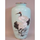 A 20thC pale blue enamel vase of baluster form, decorated in colours with a pair of cranes  10"h