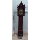 A 20thC stained wooden longcase clock of diminutive proportions with an arched hood, flank pillars