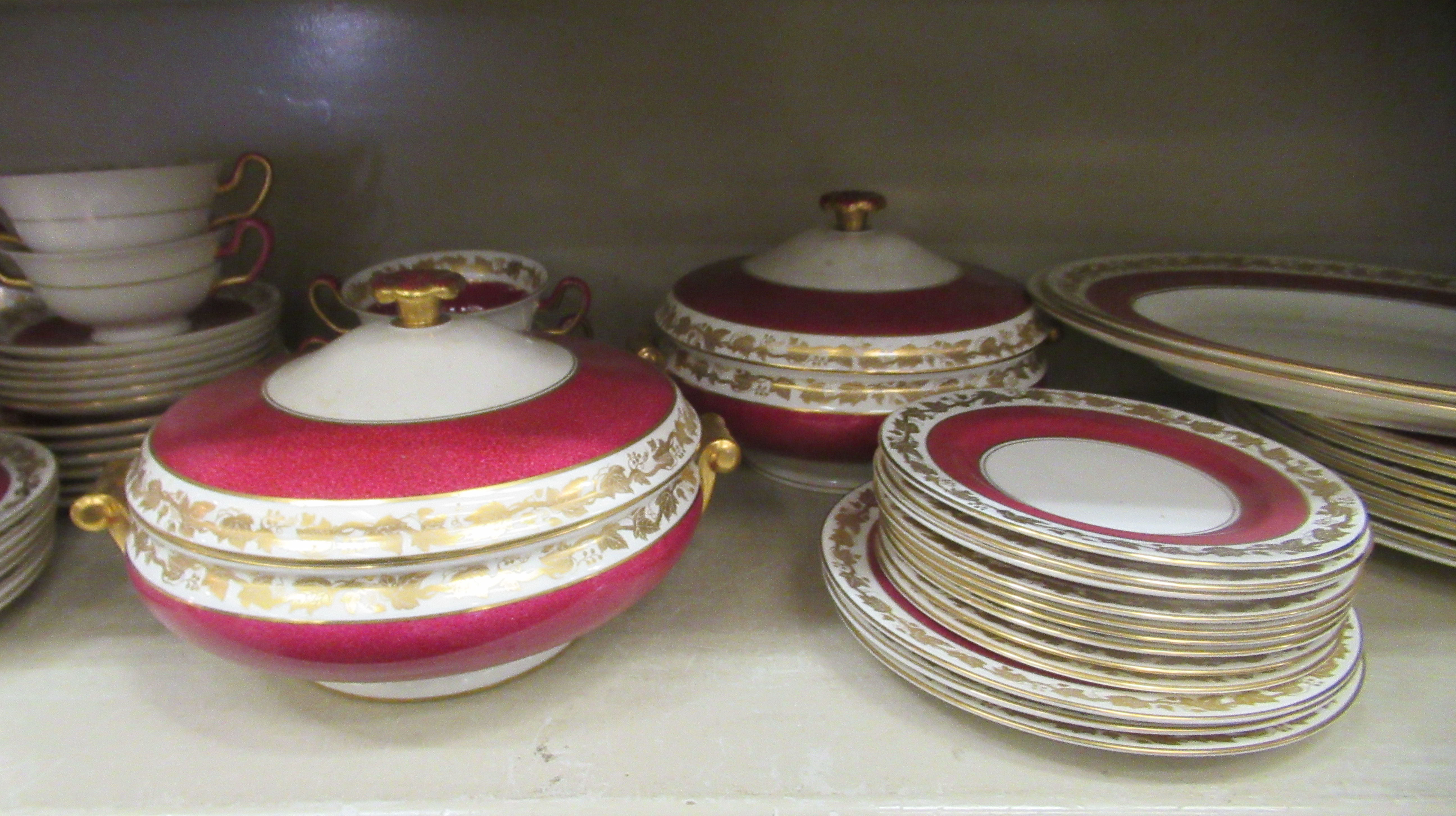 A Wedgwood china dinner service, decorated with maroon bands and a gilded fruiting vine border - Image 3 of 6