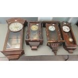 Four late 19thC walnut and mahogany cased Vienna regulators, each 8 day movement faced by a Roman