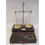 Mid 19thC traveller's treadle action balance scales with lacquered brass and steel fittings, mounted