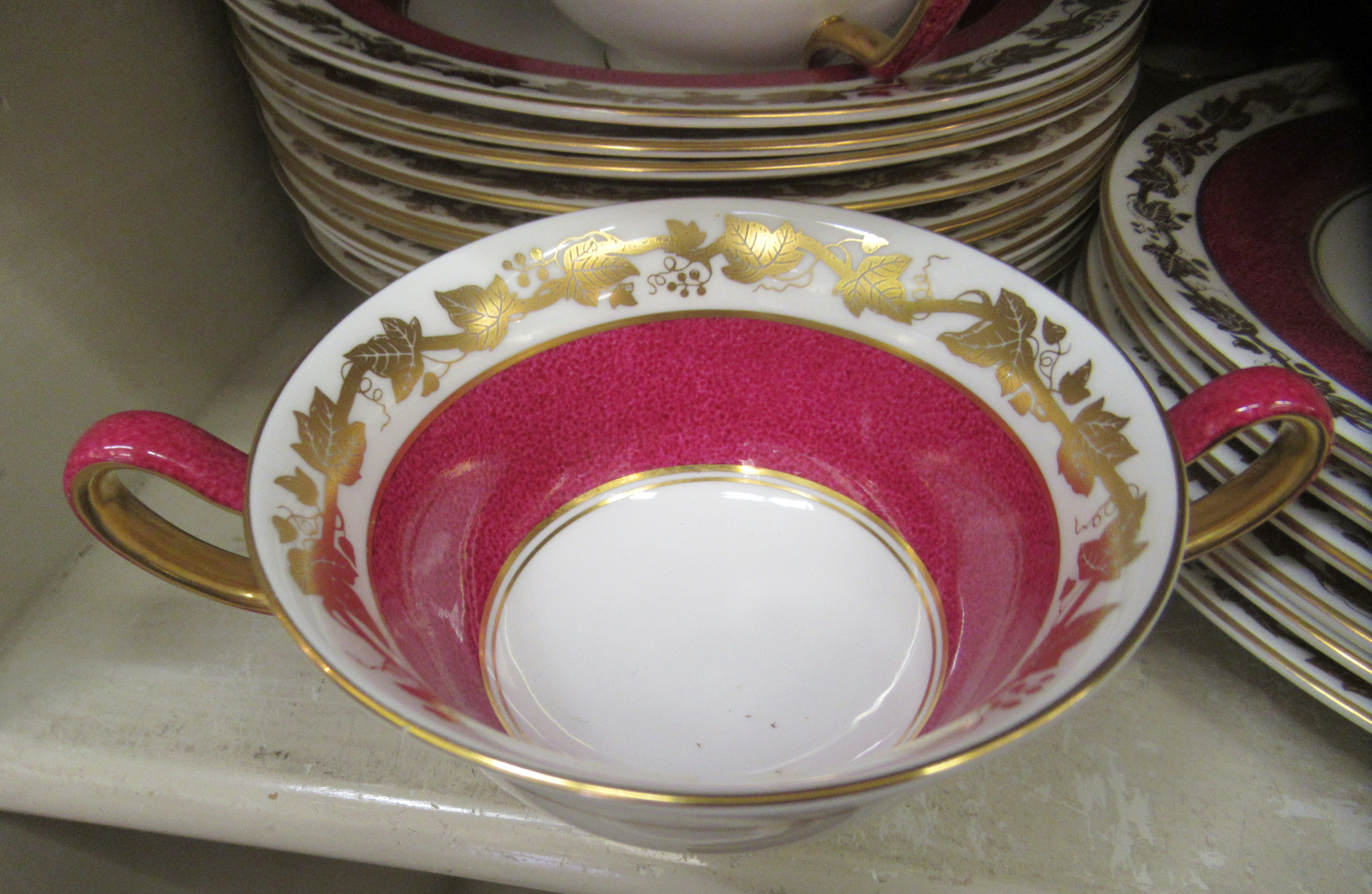 A Wedgwood china dinner service, decorated with maroon bands and a gilded fruiting vine border - Image 5 of 6