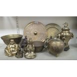 20thC Oriental metalware: to include a brass plaque  12.5"dia; and two decoratively cast brass