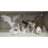 Decorative ceramics: to include a Kaiser porcelain figure, a hunter  10"h