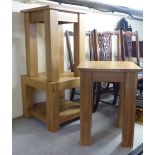 Three modern light oak occasional tables, raised on square legs  largest 24"h  17.5"w
