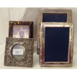 Four variously sized and framed photograph frames: to include examples in silver plate?? and