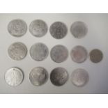 Thirteen Chinese silver and white metal coins