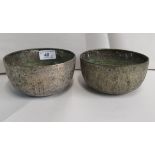 A pair of late 19thC Chinese silver coloured metal bowls, decorated with flora  5"dia