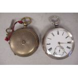 An engine turned white metal cased full hunter pocket watch, faced by a white enamel Roman dial,