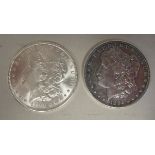 Two silver one dollar coins 1896 and 1902