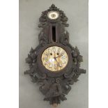 A late 19thC Black Forest wall clock; the 8 day movement faced by an enamelled Roman dial  35"h