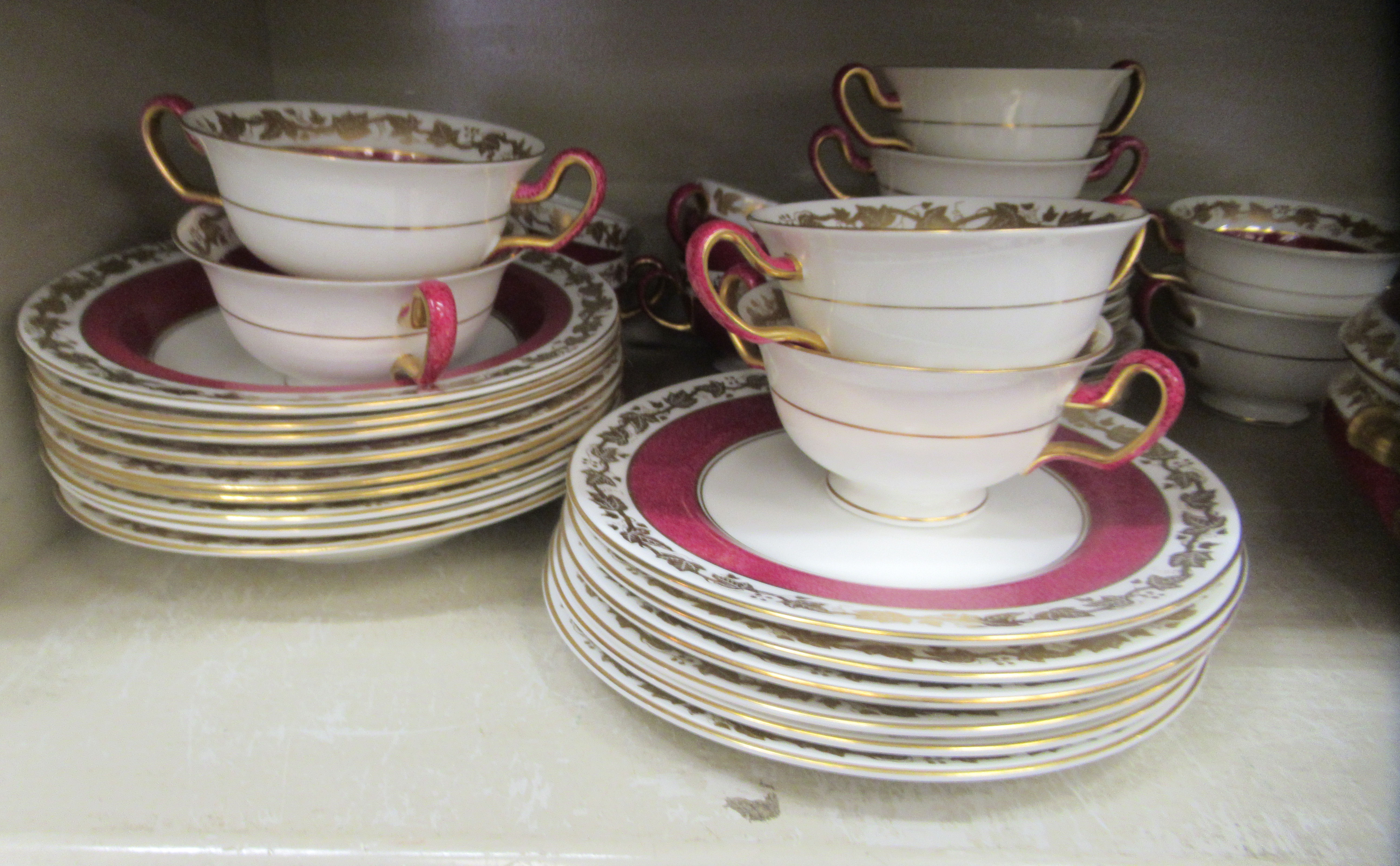 A Wedgwood china dinner service, decorated with maroon bands and a gilded fruiting vine border - Image 2 of 6