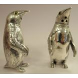 A pair of silver coloured metal novelty condiments pots, fashioned as penguins  stamped 800