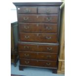 A George III mahogany chest-on-chest with a moulded cornice, over two short/six graduated long