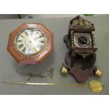 Two 20thC walnut cased timepieces; faced by Roman dials  25"h & 13"dia