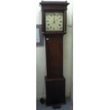 A George III oak longcase clock, the hood with a straight cornice, over a square window, straight