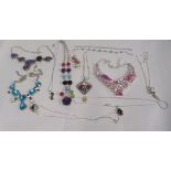 Silver, white coloured metal and other items of personal ornament: to include necklaces, set with