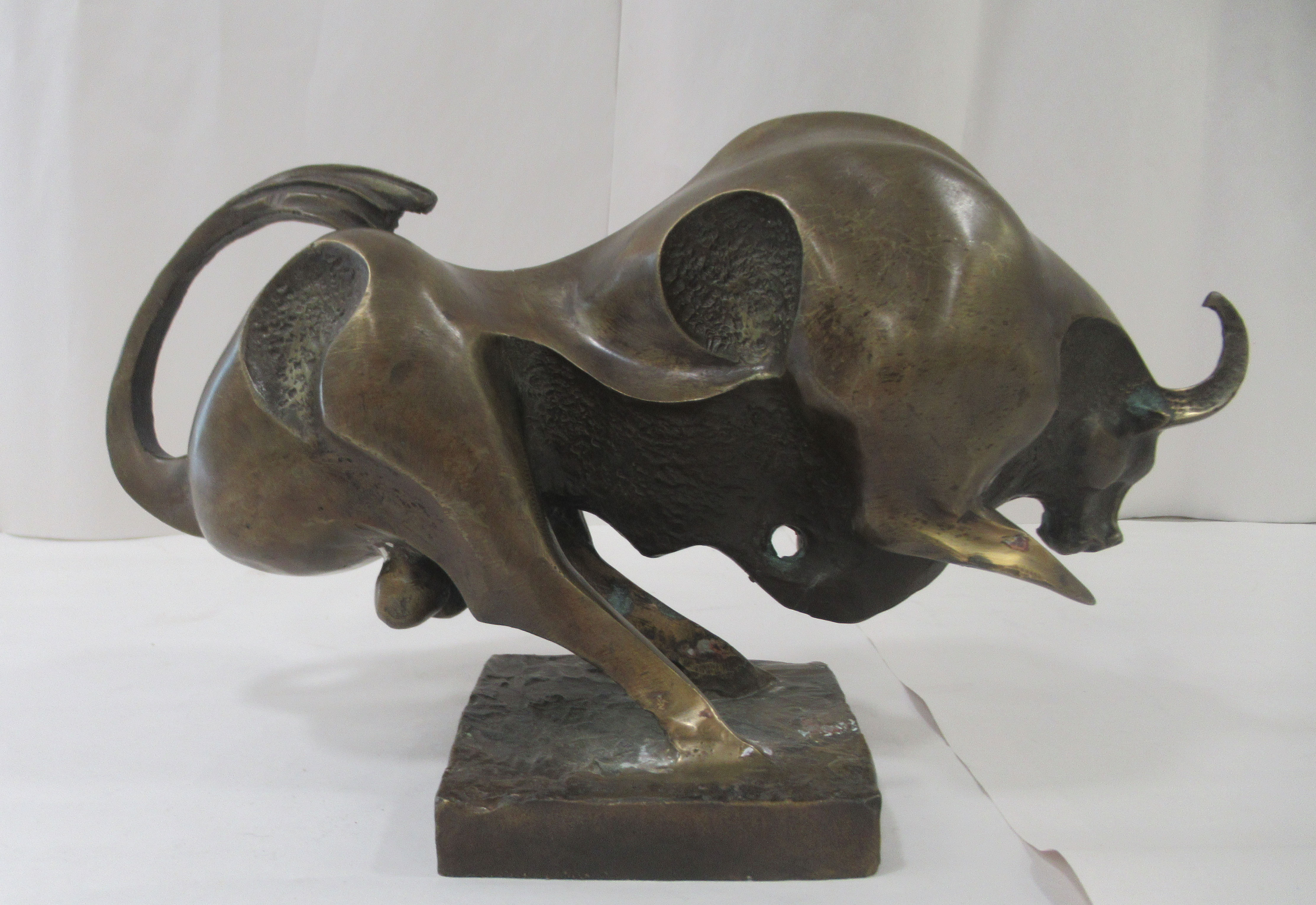 A Salvador Dali inspired abstract cast bronze ornament, a bull, on a plinth  8"h - Image 3 of 3