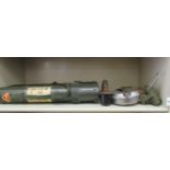 Military and related artefacts: to include a bicycle lamp with a rotating shade; a dummy hand