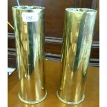 A pair of Great War period brass shell cases  11.5"h