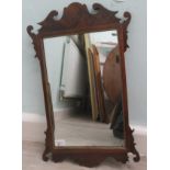 A Regency mirror, set in a fret carved mahogany and gilt frame  14" x 22"
