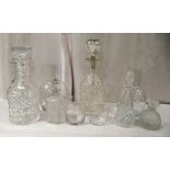 Glassware: to include four crystal decanters and two early 20thC carafes with etched floral