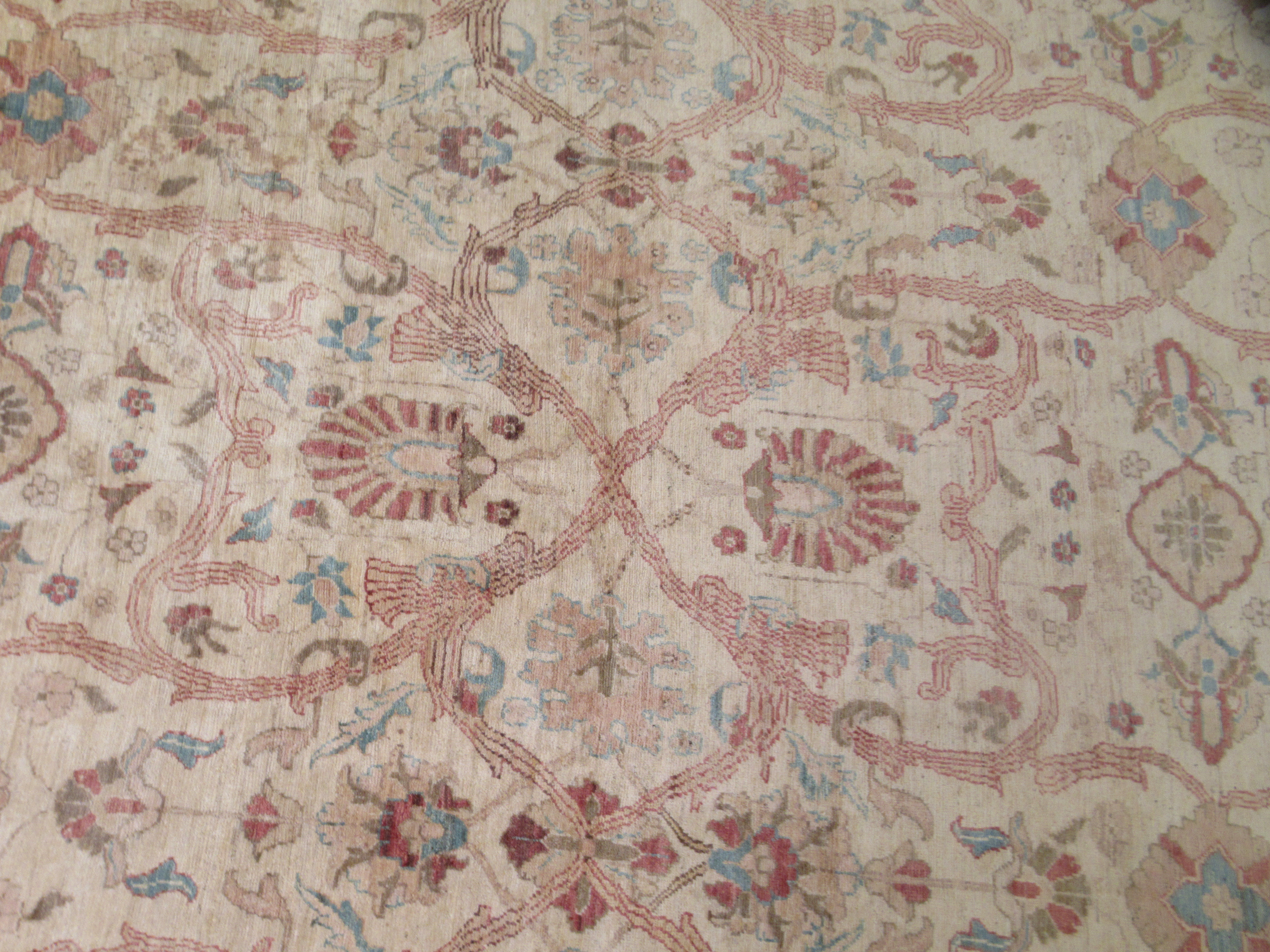 A Persian carpet, decorated with repeating stylised floral designs, on a cream coloured ground  116" - Image 2 of 5