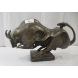 A Salvador Dali inspired abstract cast bronze ornament, a bull, on a plinth  8"h