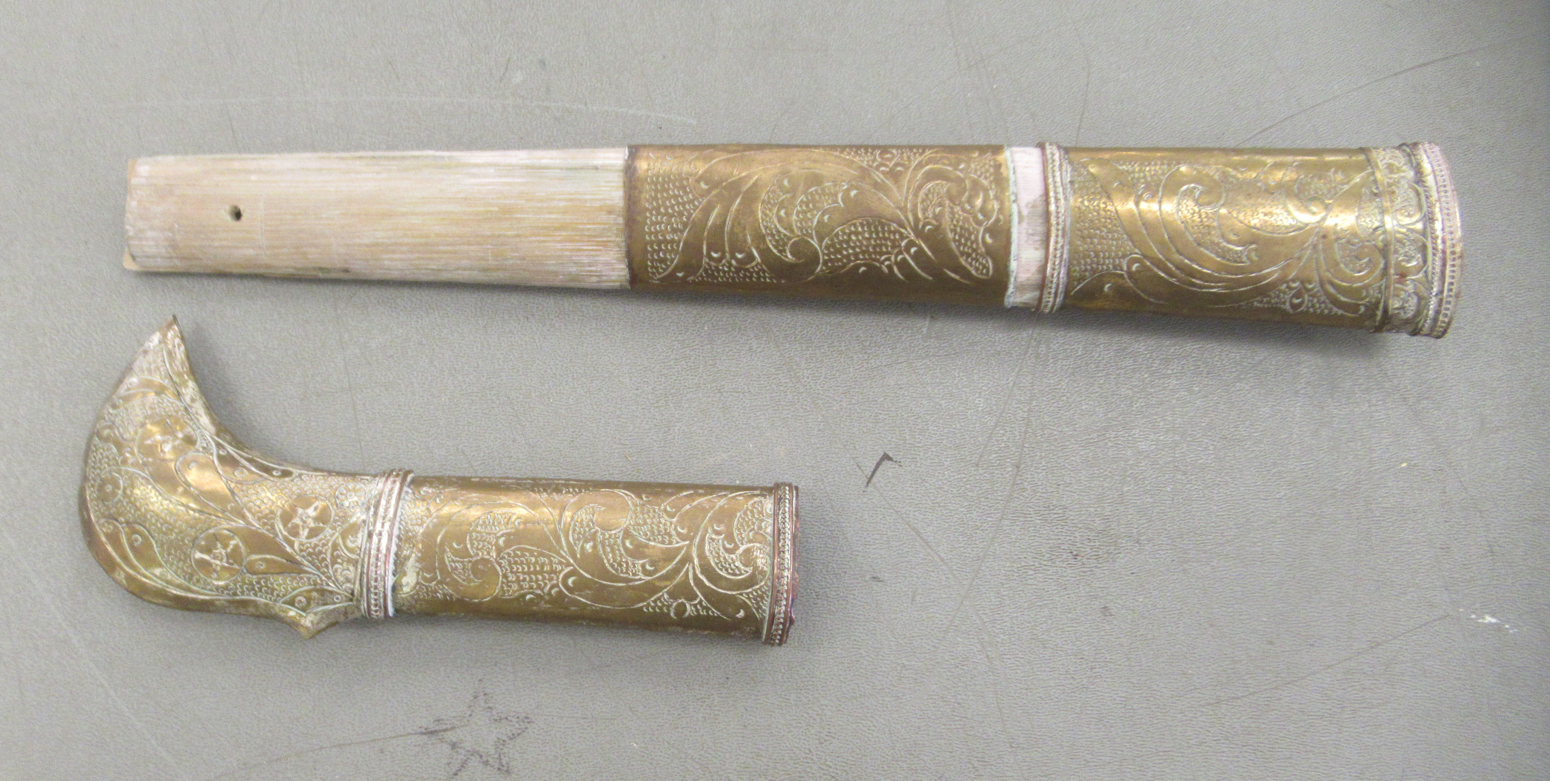 An Indo-Persian dagger with an engraved brass handle, scrolled guard and straight, part wavy edged - Image 5 of 5
