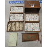 A Jackpot Mah-Jong set with bone pegs and ceramic tiles  cased with instructions