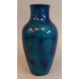 An 18thC Chinese (Kangxi) monochrome baluster shape vase, in streaky blue glaze  9"h